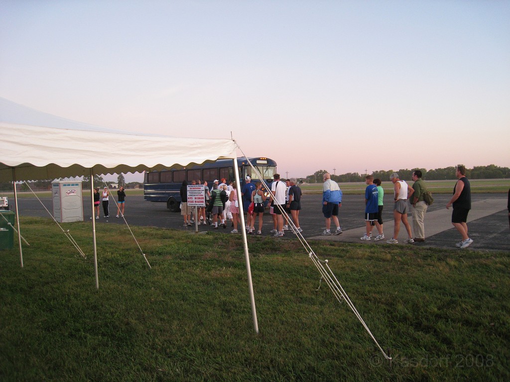 USAF Half Marathon 2009 015.jpg - Early into the parking lot, and waiting for the military school bus to pick us up for a short ride to the AF Museum.
